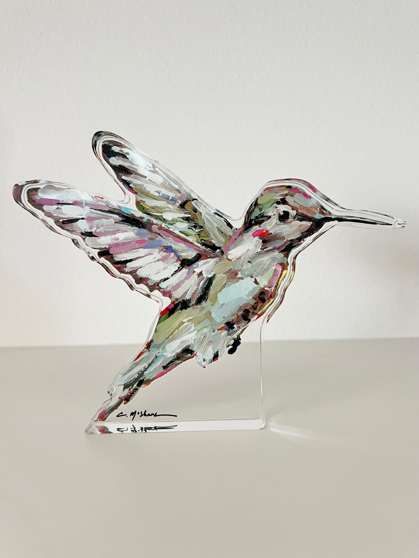 A hummingbird acrylic tabletop