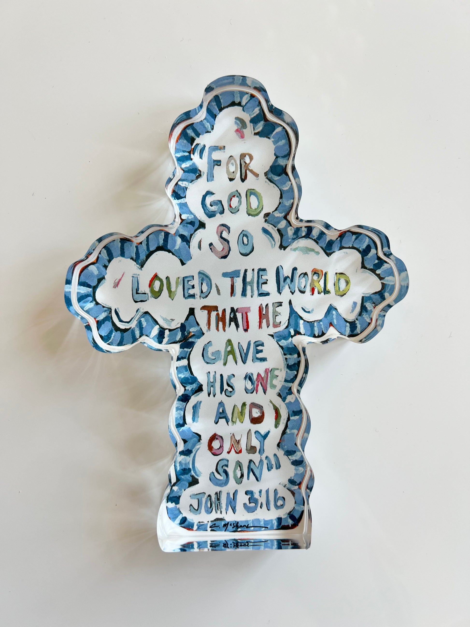 An acrylic tabletop cross with the bible verse John 3:16 that is great for Easter decor or nursery or baptism gift