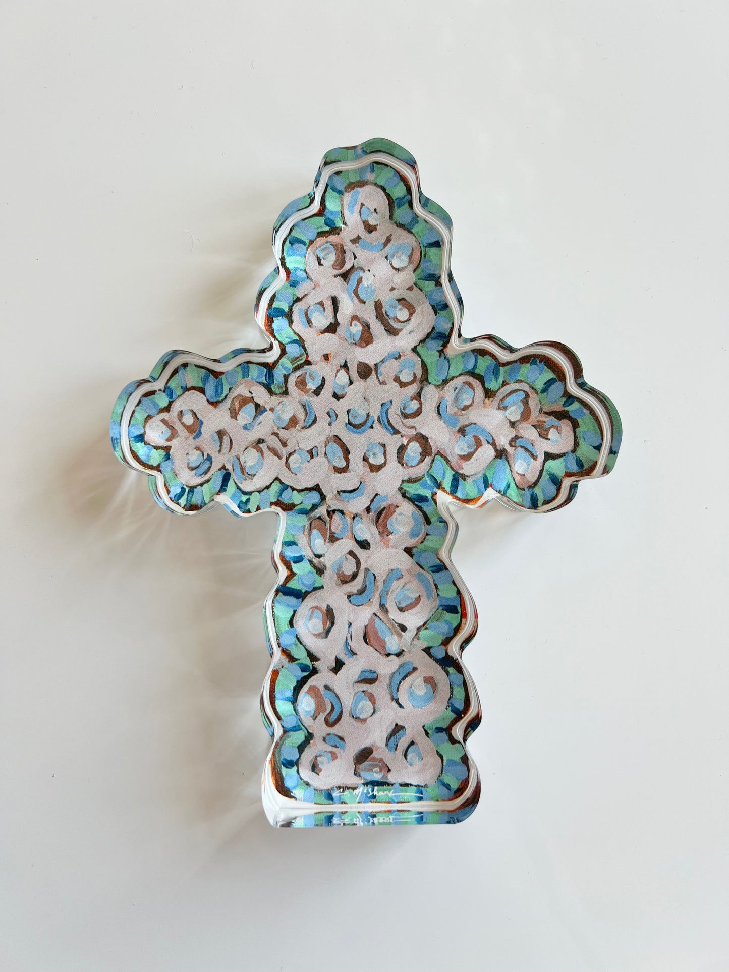 An acrylic tabletop cross that is great for Easter decor or nursery or baptism or college gift
