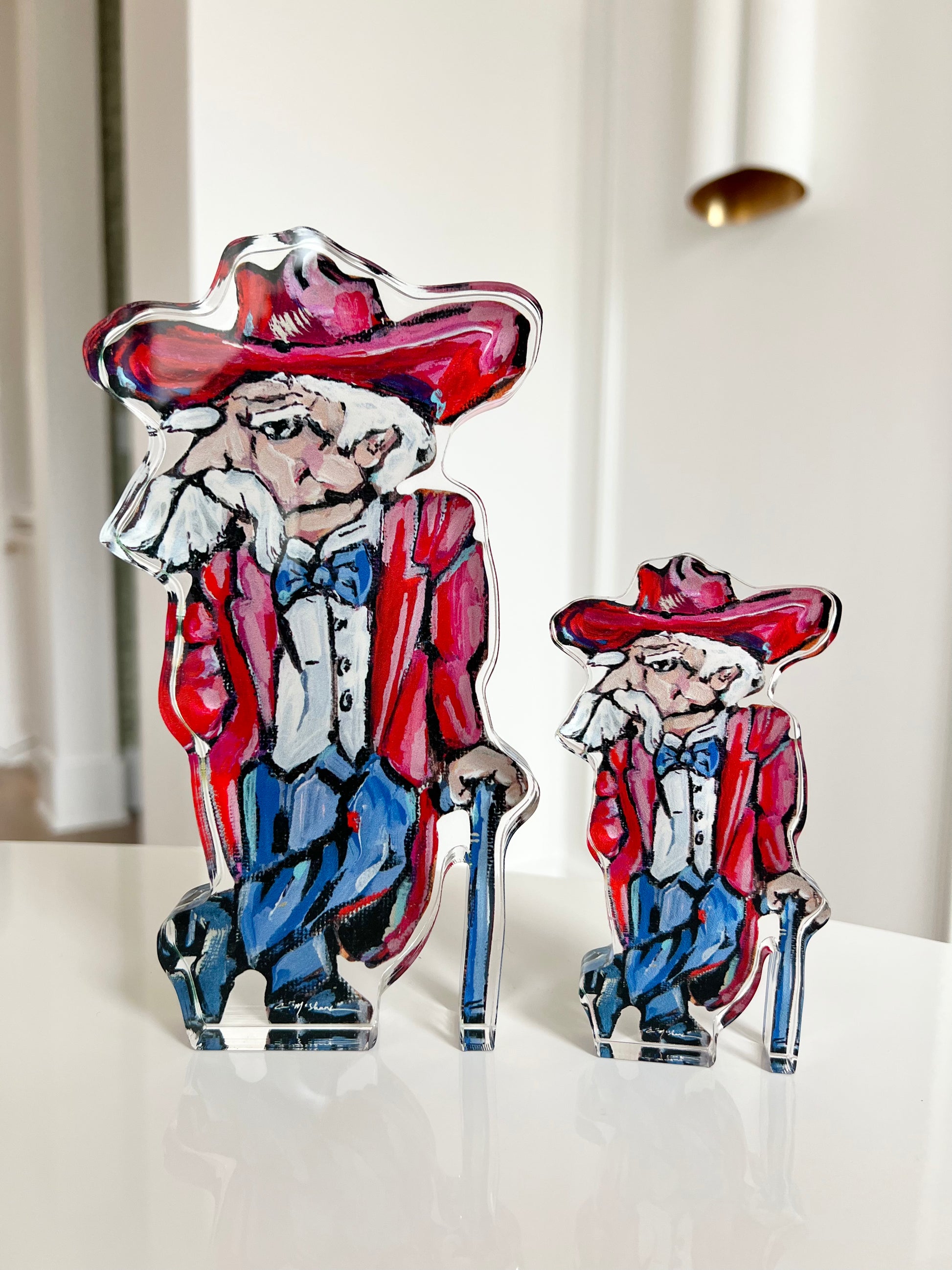 An acrylic tabletop of colonial reb for Ole Miss Rebel