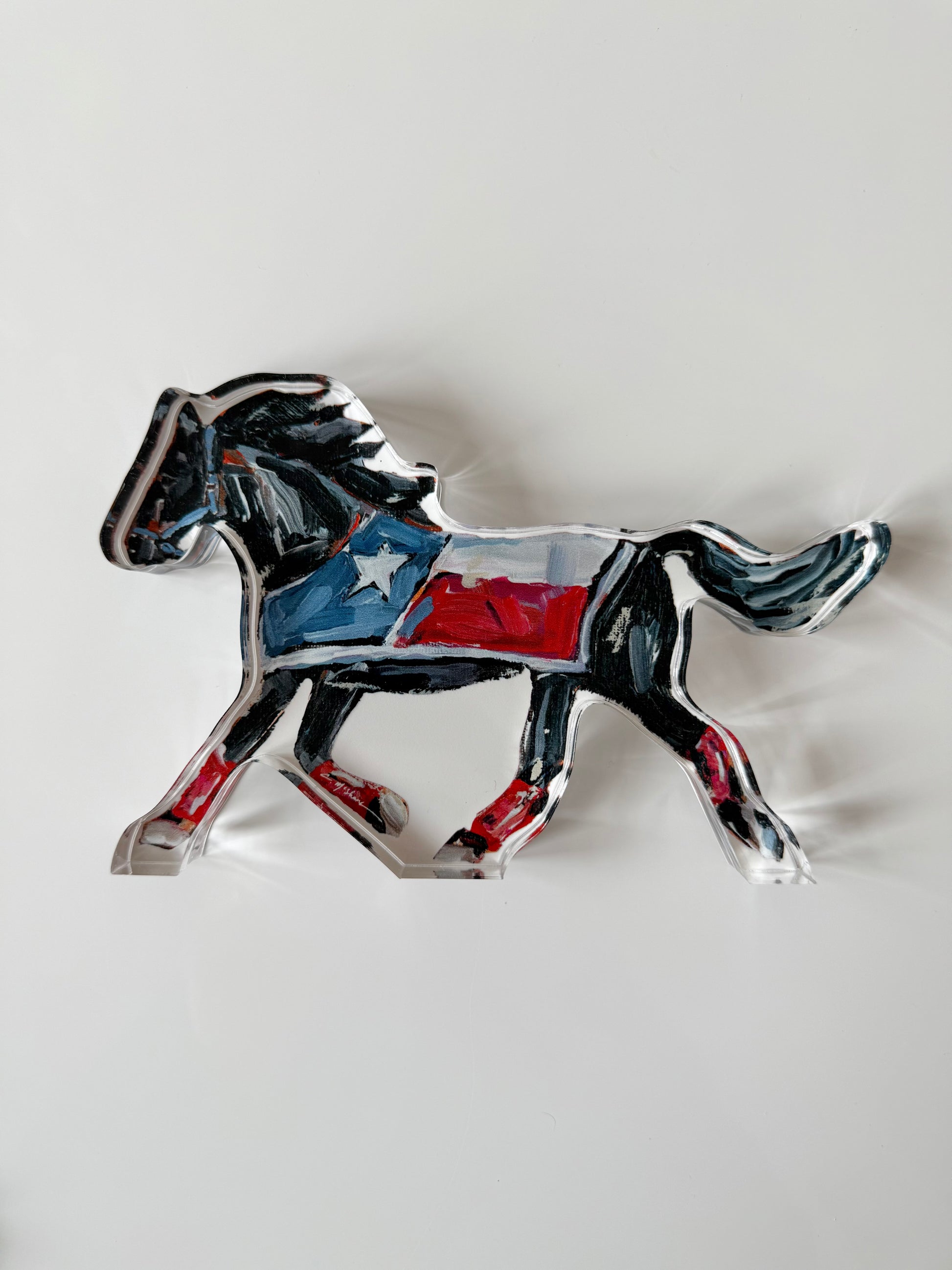 An acrylic tabletop for Southern Methodist University or SMU Dallas Texas Mustangs horse