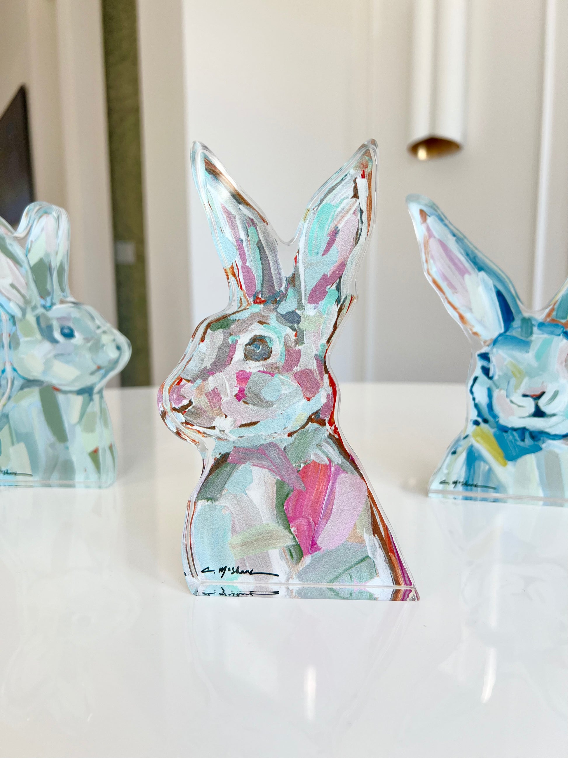 An acrylic tabletop bunny that is great for Easter decor or a nursery gift.