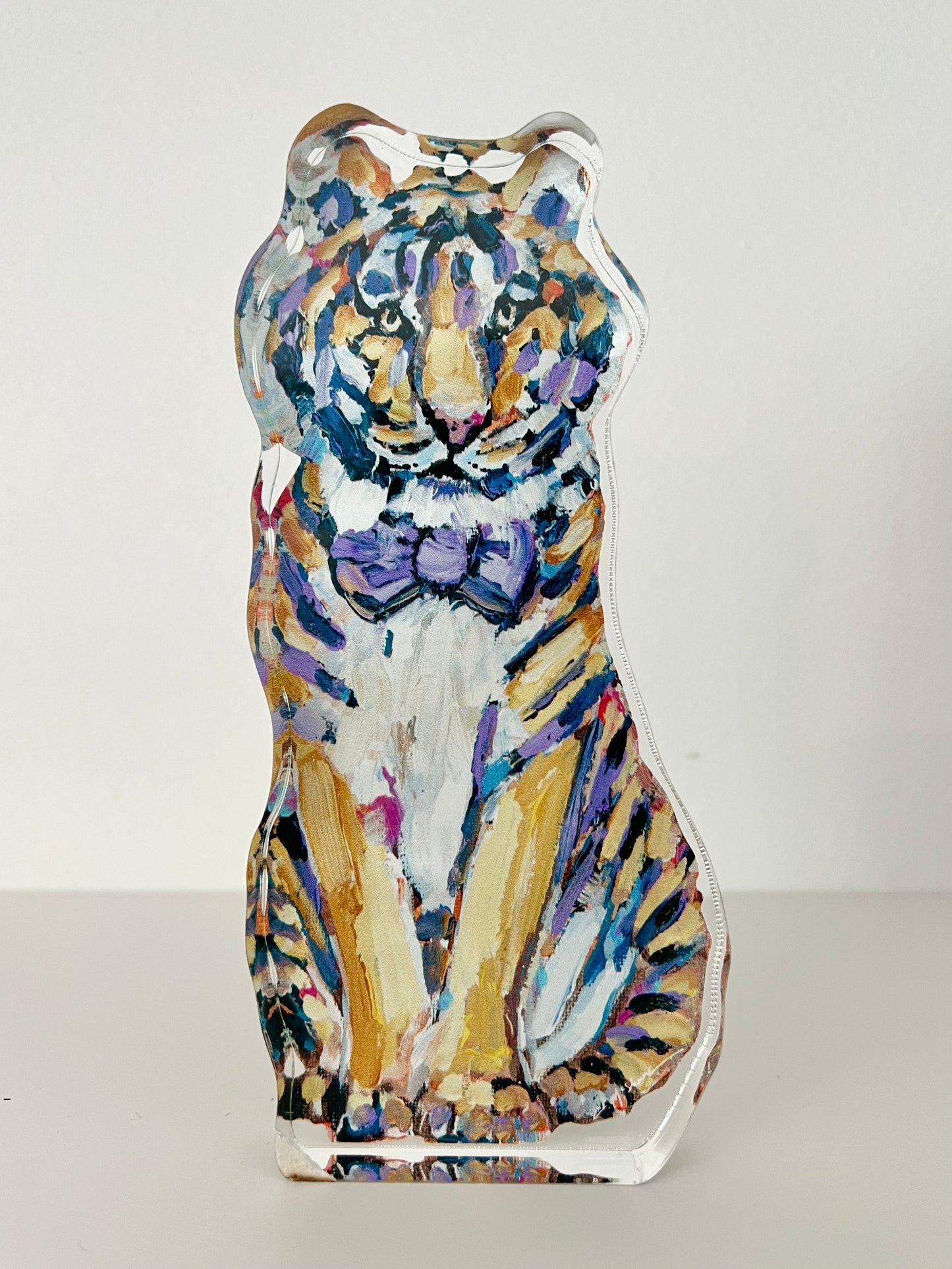 An acrylic tabletop of a yellow and purple tiger mascot for the University of Louisiana LSU college gameday or alumni gifts.