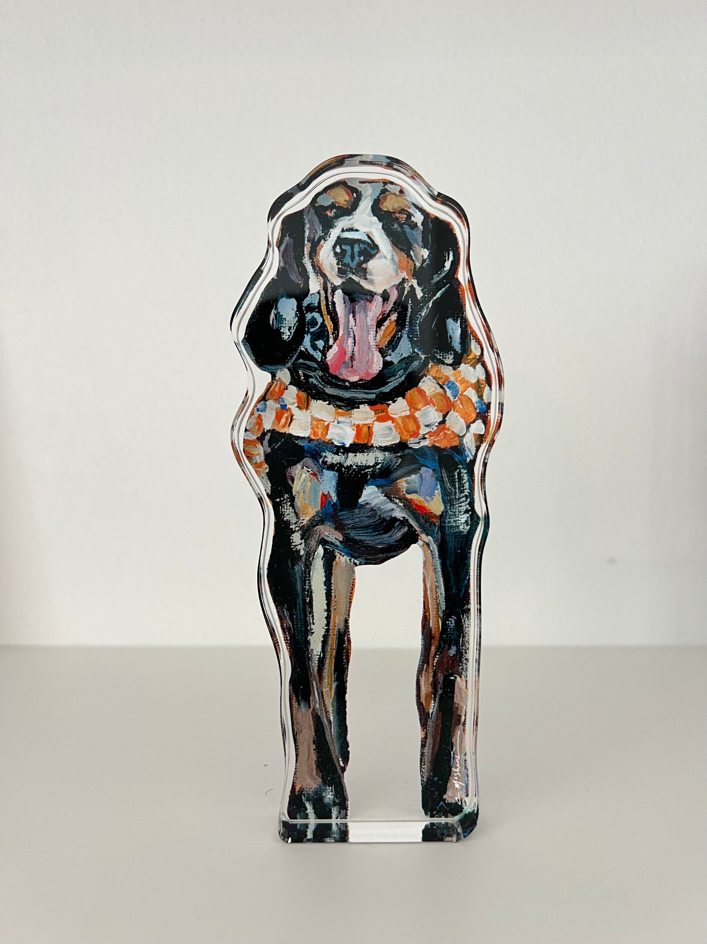 An acrylic tabletop of Smokey hound dog mascot for the University of Tennesse college gameday or alumni gifts.