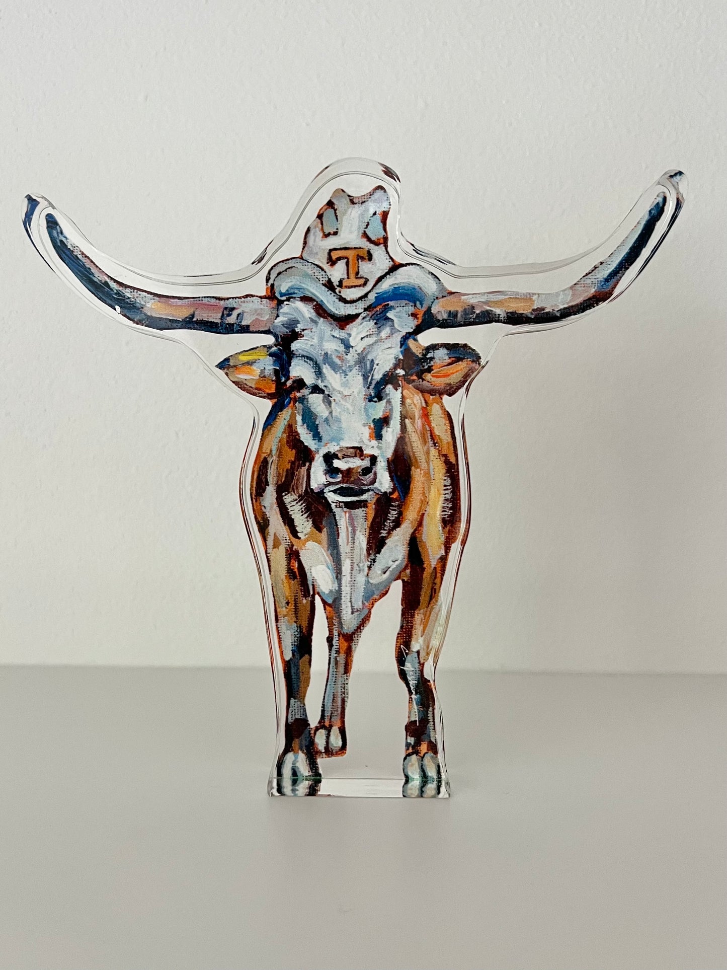 An acrylic tabletop of a Texas University Longhorn for college gameday or alumni gifts.