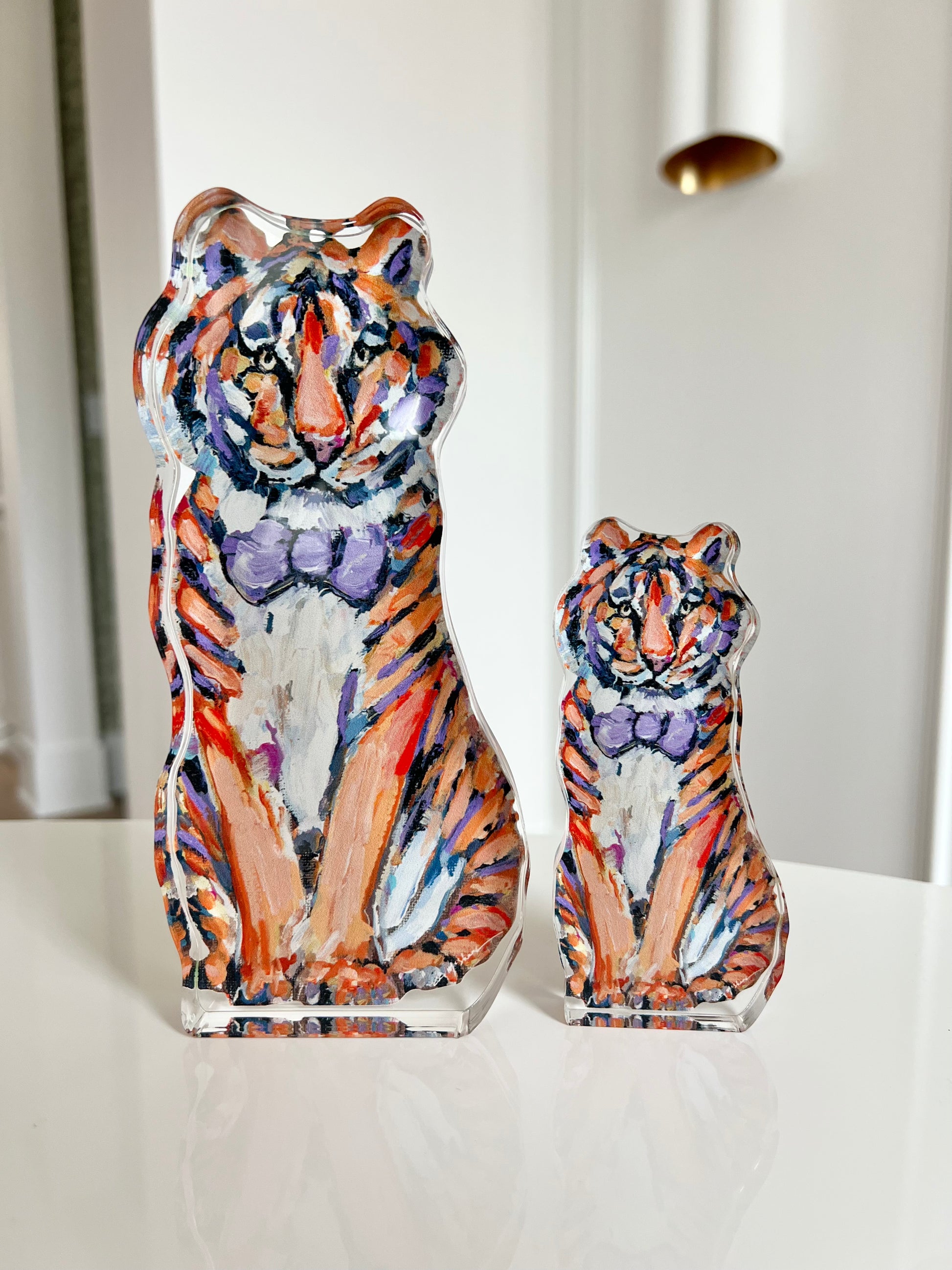 An acrylic tabletop of a purple and orange tiger for Clemson University college gameday or alumni gifts.