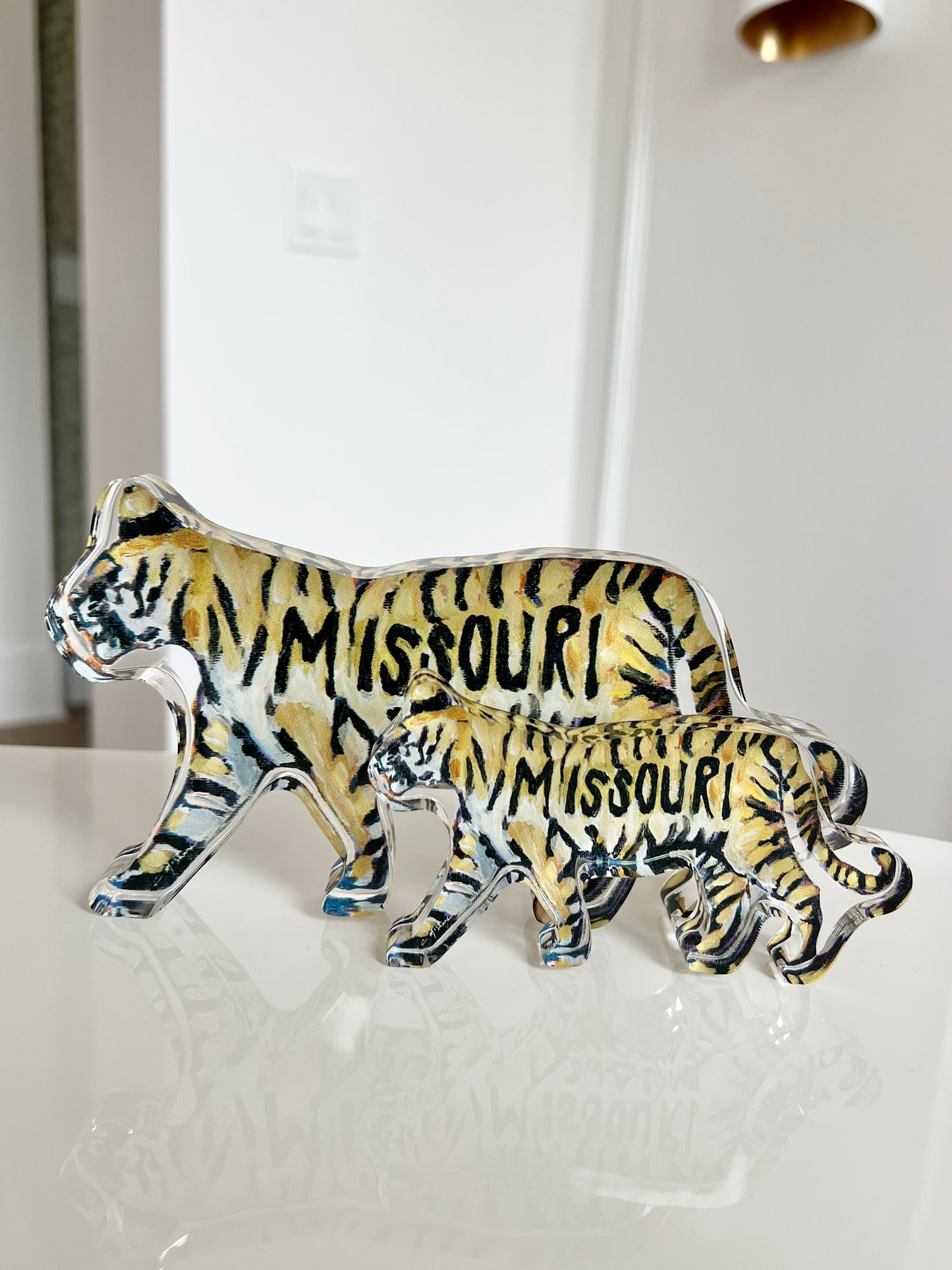 An acrylic tabletop shelfie of a gold and black tiger for Mizzou or University of Missouri gameday.