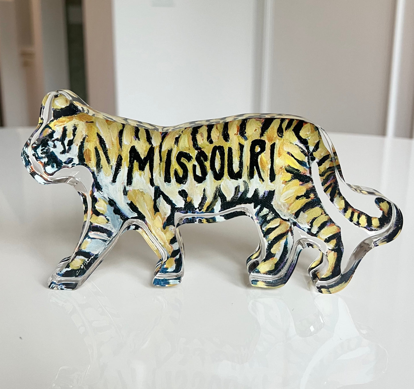 An acrylic tabletop shelfie of a gold and black tiger for Mizzou or University of Missouri gameday.