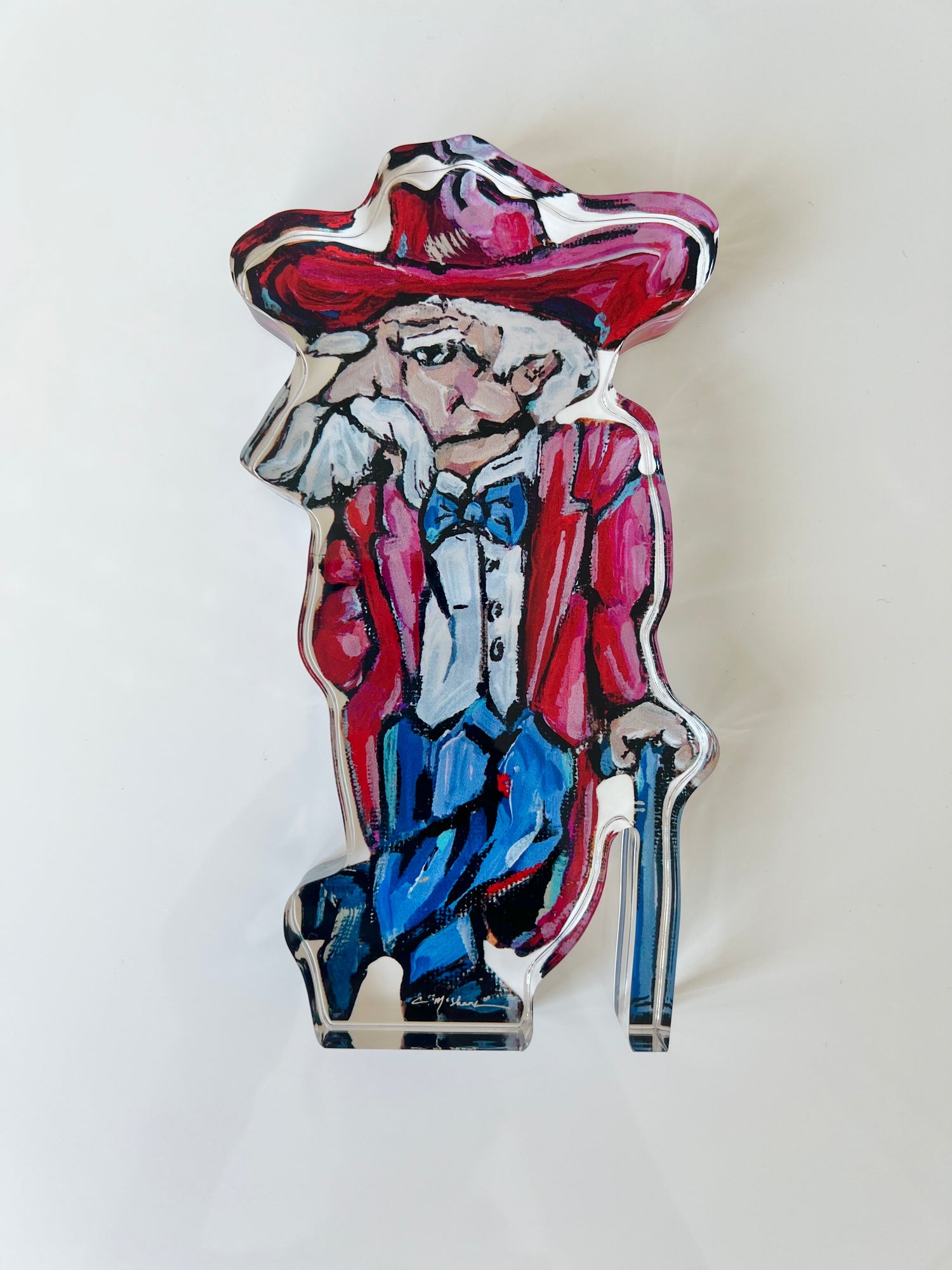 An acrylic tabletop of colonial reb for Ole Miss Rebel